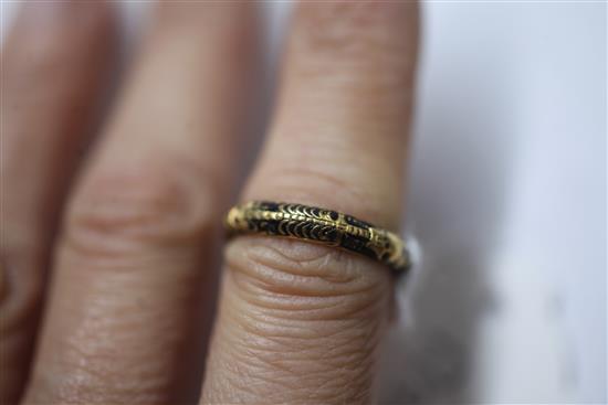 A George II gold and black enamel skeleton momento mori ring, size P/Q.